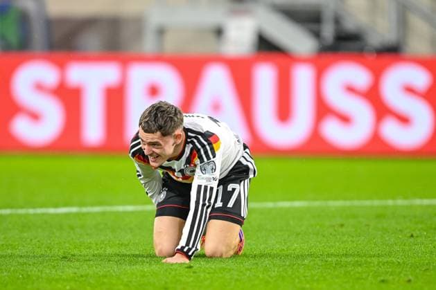 Florian Wirtz Germany looks dejected on the ground during the FIFA World Cup 2026 qualifier match between Luxembourg and Germany at Stade de Luxembourg on November 14, 2025 in Luxembourg, Luxembourg Photo by Harry Langer DeFodi Images