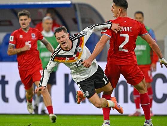 14 11 2025, Football World Cup Qualification Europe 2025 26, Matchday 9, Luxembourg Germany, at Stade de Luxembourg Croix de Gasperich, Luxembourg , Florian Wirtz Germany goes down v l Nick Woltemade Germany and Seid Korac Luxembourg