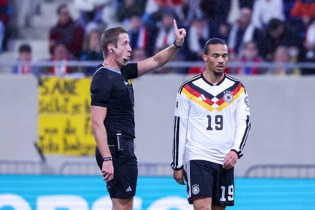 Referee Referee John Brooks ENG with instructions, with Leroy Sane Germany , Luxembourg vs Germany, Football, Men, World Cup Qualification, Country Match, Group Stage, Group A, Stade de Luxembourg, UEFA,14 11 2025 Luxembourg City Luxembourg Copyright: xkolbert-press MartinxAgüerax