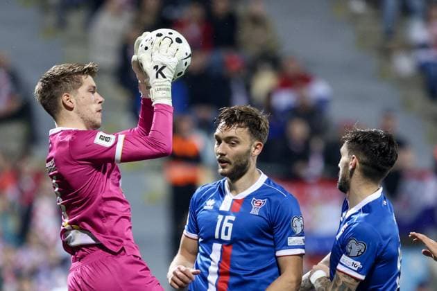 Fußball, WM Quali, Kroatien - Faröer Inseln Croatia v Faroe Islands - FIFA World Cup, WM, Weltmeisterschaft, Fussball 2026 Qualifier RIJEKA, CROATIA - NOVEMBER 14: Mattias Lamhauge of Faroe Islands and Gunnar Vatnhamar of Faroe Islands during the FIFA World Cup 2026 qualifier match between Croatia and Faroe Islands at HNK Rijeka Stadium on November 14, 2025 in Rijeka, Croatia.  NelxPavletic PIXSELL