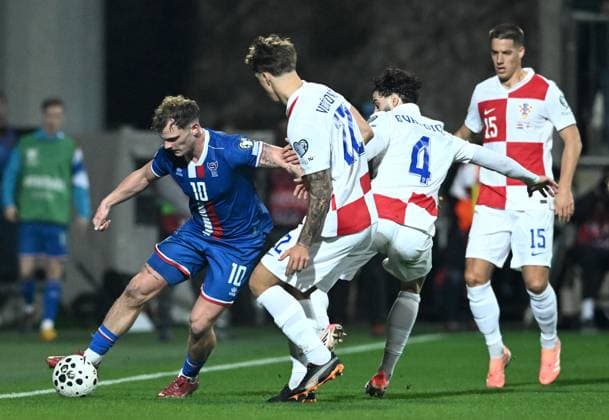 Croatia v Faroe Islands - FIFA World Cup, WM, Weltmeisterschaft, Fussball 2026 Qualifier RIJEKA, CROATIA - NOVEMBER 14: Meinhard Olsen of Faroe Islands competes for the ball with Josko Gvardiol of Croatia and Luka Vuskovic of Croatia during the FIFA World Cup 2026 qualifier match between Croatia and Faroe Islands at HNK Rijeka Stadium on November 14, 2025 in Rijeka, Croatia.  MarkoxLukunic PIXSELL