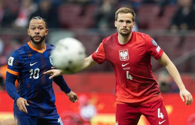 World Cup 2026 European qualifiers: Poland vs Netherlands Memphis Depay (NED), Tomasz Kedziora (POL) during World Cup 2026 European qualifiers: Poland vs Netherlands match in Warsaw, Poland on November 14, 2025 Warsaw Poland  Copyright: xFotoxOlimpikx originalFilename:jastrzebowski-worldcup251114_npxzM.jpg