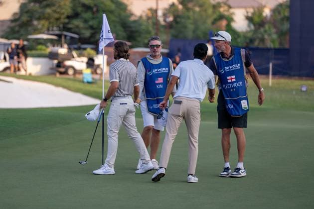 Tommy Fleetwood ENG , Michael Kim USA Round 2 of the DP World Tour Championship 2025, held at the Jumeirah Golf Estate, Earth Course, Dhabi, United Arab Emerites 13 16 November 2025 Dubai United Arab Emerites DP World Tour, Dp World Tour Championship 2025, Golf x11290x  Copyright: xWilliamxBrodin TTx DP World Tour Championship 2025