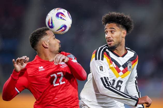 14 11 2025, Football, International match, World Cup Qualification Europe, Germany Luxembourg, Stade de Luxembourg Croix de Gasperich, Luxembourg , 9 Matchday, Season 2025 2026 Marvin Martins LUX 22 in duel against Kevin Schade GER 16 Regulations prohibit any use of photographs as image sequences and or quasi video Luxembourg