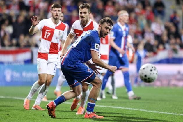 Croatia v Faroe Islands - FIFA World Cup, WM, Weltmeisterschaft, Fussball 2026 Qualifier RIJEKA, CROATIA - NOVEMBER 14: Josip Stanisic of Croatia and Gunnar Vatnhamar of Faroe Islands during the FIFA World Cup 2026 qualifier match between Croatia and Faroe Islands at HNK Rijeka Stadium on November 14, 2025 in Rijeka, Croatia.  NelxPavletic PIXSELL