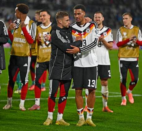 14 11 2025, Football World Cup Qualification Europe 2025 26, Matchday 9, Luxembourg Germany, at Stade de Luxembourg Croix de Gasperich, Luxembourg v l Joshua Kimmich Germany and Felix Nmecha Germany hug each other