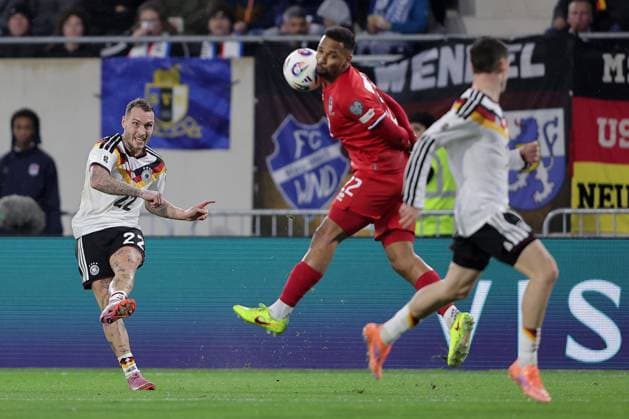 David Raum Germany 22 crosses the ball to Marvin Martins Luxembourg 22, curious Football, UEFA World Cup Qualification 2026, Season 2025 2026, Group A, European Qualifiers 14 11 2025 Luxembourg Germany Luxembourg vs Germany Stade de Luxembourg, Luxembourg