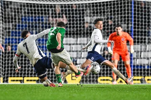 14th November 2025; St Andrews, Birmingham, Midlands, England; UEFA European Under 21 Championship Qualifying, England versus Republic of Ireland; Jacob Devaney of Ireland U21, U 21 shoots at goal but is blocked by a sliding Jobe Bellingham of England U21  GodfreyxPitt