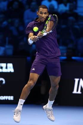 Alexander Zverev vs Felix Auger-Aliassime Felix Auger-Aliassime of Canada in action during the Round Robin singles match between Alexander Zverev of Germany and Felix Auger-Aliassime of Canada on Day six of the Nitto ATP, Tennis Herren World Tour Finals. Turin Inalpi Arena Italy Copyright: xMarcoxCanonierox