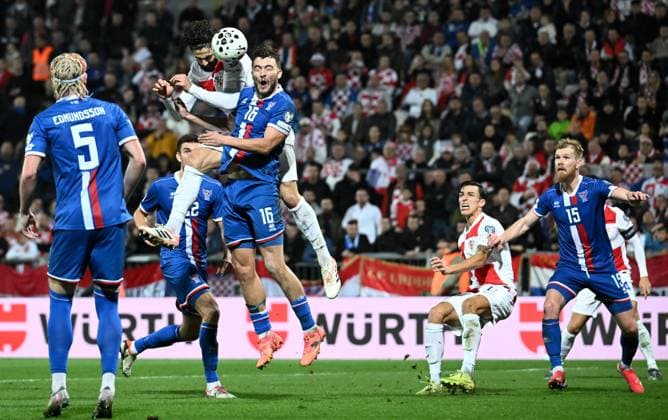 Croatia v Faroe Islands - FIFA World Cup, WM, Weltmeisterschaft, Fussball 2026 Qualifier RIJEKA, CROATIA - NOVEMBER 14: Josko Gvardiol of Croatia and Gunnar Vatnhamar of Faroe Islands jump for the ball during the FIFA World Cup 2026 qualifier match between Croatia and Faroe Islands at HNK Rijeka Stadium on November 14, 2025 in Rijeka, Croatia.  MarkoxLukunic PIXSELL