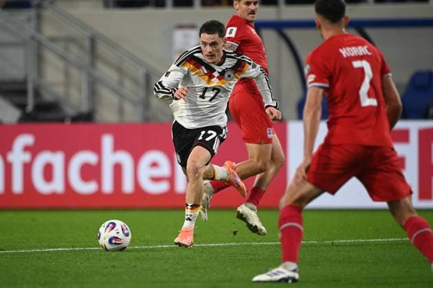 Florian WIRTZ GER vs Seid KORAC LUX action, duel, Luxembourg LUX Germany GER football international, World Cup Qualification Europe Group A, matchday 9, matchday9, on 14 1 2025, Stade de Luxembourg, Luxembourg, Â