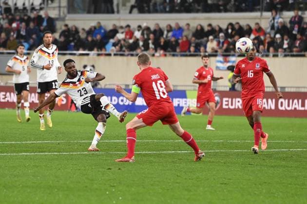 Goal chance from Ridle BAKU GER against Mathias OLESEN LUX Action, duel, Luxembourg LUX Germany GER 0 2 Soccer international, World Cup Qualification Europe Group A, matchday 9, matchday9, on 14 1 2025, Stade de Luxembourg, Luxembourg, Â