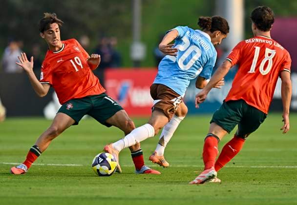 Portugal v Belgium : Round of 32- FIFA U-17 World Cup Qatar 2025 Tomas Soares of Portugal and Mohammed El Adfaoui of Belgium in action during the FIFA U-17 World Cup Qatar 2025 Round of 32 match between Portugal and Belgium in Doha, Qatar, on November 14, 2025. DOHA Qatar Copyright: xNOUSHADxTHEKKAYILx