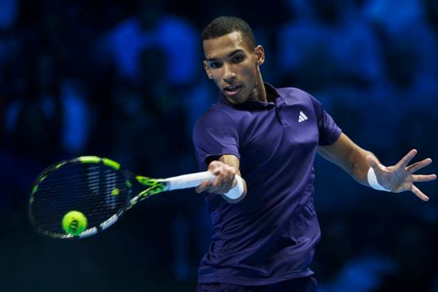 Nitto ATP, Tennis Herren Finals 2025 - Day Six Felix Auger-Aliassime of Canada plays a forehand during his round robin singles match against Alexander Zverev of Germany during day six of the Nitto ATP Finals 2025. Felix Auger-Aliassime won 6-4, 7-6(4). Turin Italy Copyright: xNicolòxCampox