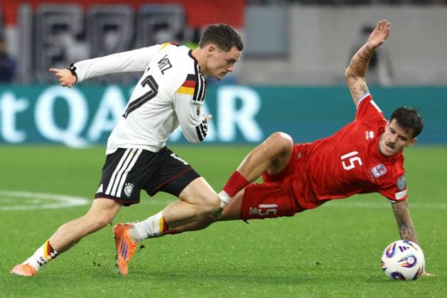 FLORIAN WIRTZ, Germania, OLIVIER THILL, Lussemburgo, World Cup 2026 Qualyfing, Luxembourg vs Germany 0-2, 14-11-2025, Contrasto, Action QUALIFICAZIONI MONDIALI 2026 LUSSEMBURGO-GERMANIA 0-2
