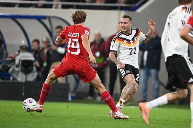 David RAUM GER vs Mathias OLESEN LUX action, duel, Luxembourg LUX Germany GER 0 2 Soccer international, World Cup Qualification Europe Group A, matchday 9, matchday9, on 14 1 2025, Stade de Luxembourg, Luxembourg, Â