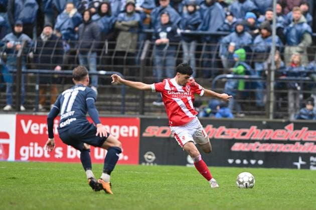 Can Moustfa 17 FC Energie Cottbus with ball in action while a player of SV Babelsberg 03 defends Player with ball in action Copyright: xSpeedshotx