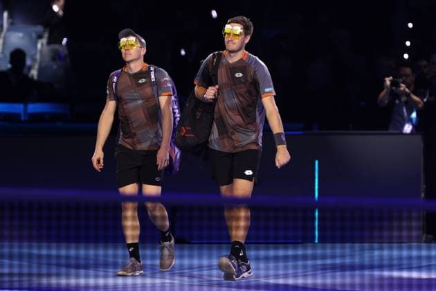 Boletti Vavassori vs Heliovaara Patten Harri Heliovaara of Finland (L) and Henry Patten of Great Britain (R) look on during the semi-final doubles match between Simone Bolelli of Italy and Andrea Vavassori of Italy against Harri Heliovaara of Finland and Henry Patten of Great Britain on Day seven of the Nitto ATP, Tennis Herren World Tour Finals. Turin Inalpi Arena Italy Copyright: xMarcoxCanonierox