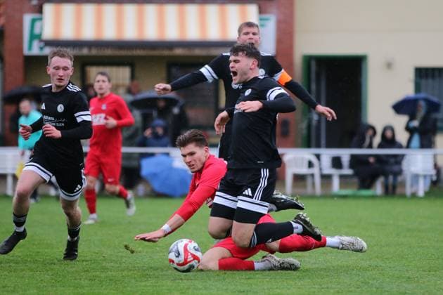 15 11 2025 soccer men 2025 2026 dachbleche24 state cup quarterfinals SSV 80 Gardelegen SV Dessau 05 stadium Rieselwiese Gardelegen Elia Miro Friebe Dessau, red throws himself into Max Kohlhas Grdelegen, black Gardelegen Saxony Anhalt Germany