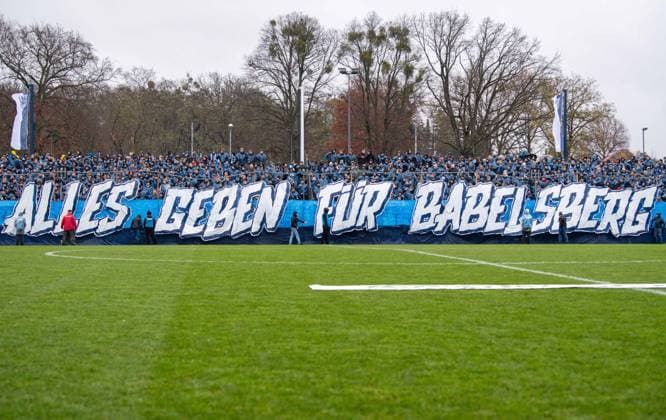 Soccer, Men, Season 2025 2026, Brandenburg State Cup quarter-finals , SV Babelsberg 03 FC Energie Cottbus, Babelsberg fans with fence banner Give everything for Babelsberg, 15 11 2025, Copyright: xSebastianxRäppold MatthiasxKochx