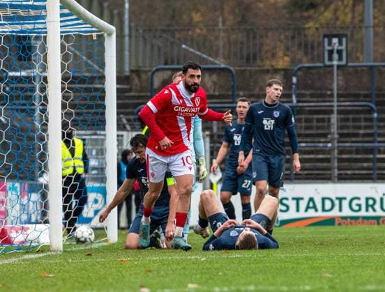 Football, Men, Season 2025 2026, Brandenburg State Cup quarter-final , SV Babelsberg 03 FC Energie Cottbus, Tolcay Cigerci Energie Cottbus , Cheering after scoring 2 3, 15 11 2025, Copyright: xSebastianxRäppold MatthiasxKochx