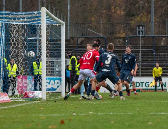 Football, Men, Season 2025 2026, Brandenburg State Cup quarter-final , SV Babelsberg 03 FC Energie Cottbus, Tolcay Cigerci Energie Cottbus scores the goal to 2 3 against goalkeeper Yannic Stein Babelsberg , Philipp Zeiger Babelsberg and Jannis Lang Babelsberg , 15 11 2025, Copyright: xSebastianxRäppold MatthiasxKochx