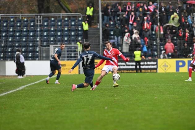 Henry Rorig 3 FC Energie Cottbus in a duel with Gordon Büch 27 SV Babelsberg 03 for the ball Duel for the ball Copyright: xSpeedshotx
