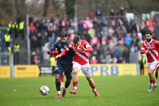 George Didoss 17 SV Babelsberg 03 in a duel with Tolcay Cigerci 10 FC Energie Cottbus for the ball Duel for the ball Copyright: xSpeedshotx