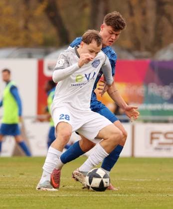 15 11 2025, Germany, Freiberg, Soccer Regionalliga Südwest, SGV Freiberg vs FC Bayern Alzenau, f l Sen Timucin FC , Tim Niklas Pietzsch SGV