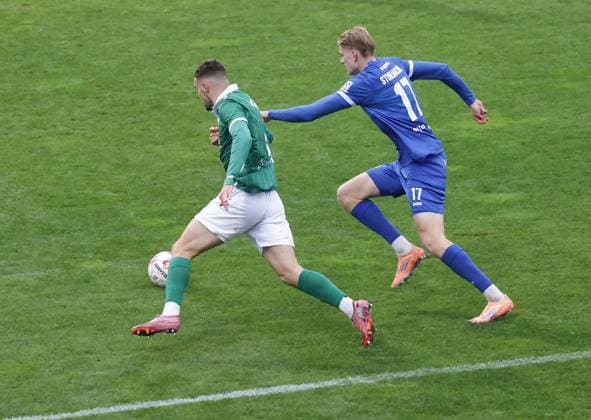 Mika Stuhlmacher SV Meppen fouls Antonio Verinac VfB Luebeck , Referee Florian Poetter gives penalty for Luebeck Football, Men, Season 2025 2026, RL Nord, VfB Luebeck vs SV Meppen DFL REGULATIONS PROHIBIT ANY USE OF PHOTOGRAPHS AS IMAGE SEQUENCES AND OR QUASI VIDEO