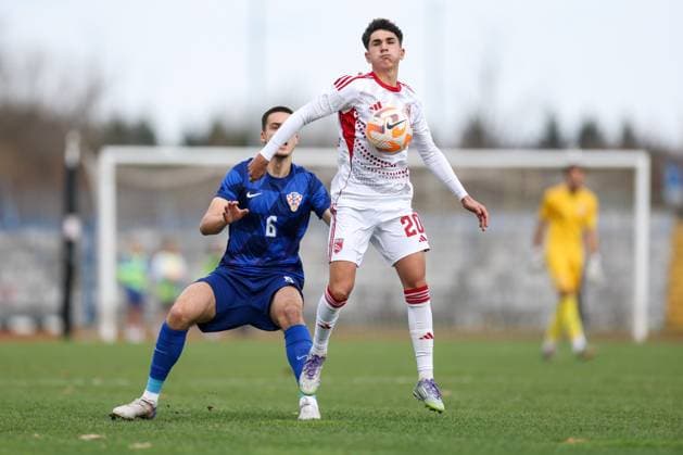 European Championships qualifiers match, Croatia U-19, Gibrltar U-19 Jonathan Rowbottom of Gibraltar and Ivan Knezevic of Croatia in action during round 2 of European Championships 2026 qualifiers match between U19 Croatia and U19 Gibraltar at Branko Cavlovic-Cavlek Stadium on November 15, 2025 in Karlovac, Croatia.  IgorxKralj PIXSELL