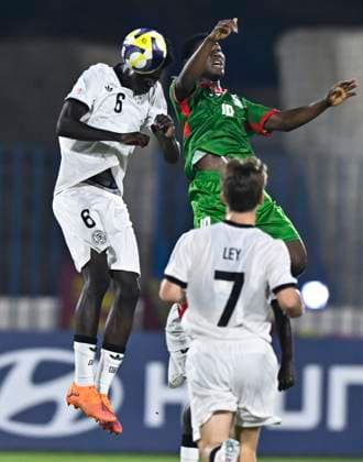 Germany v Burkina Faso: Round of 32- FIFA U-17 World Cup Qatar 2025 Mussa Kaba of Germany and Cherif Barro of Burkina Faso in action during the FIFA U-17 World Cup Qatar 2025 Round of 32 match between Germany and Burkina Faso in Doha, Qatar, on November 15, 2025. DOHA Qatar Copyright: xNOUSHADxTHEKKAYILx