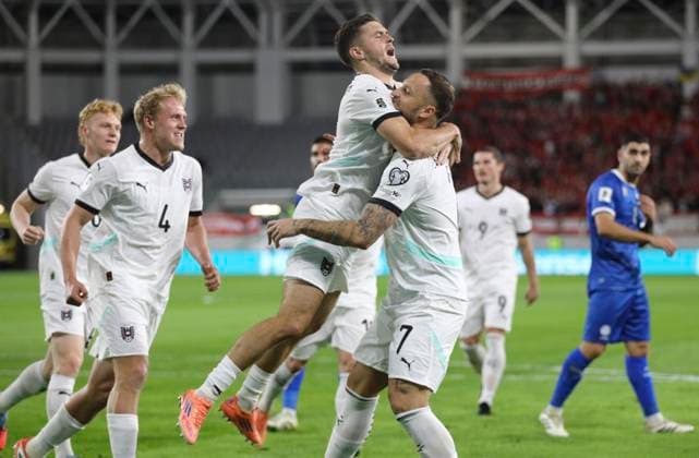 Cyprus Austria WCup Soccer Austria s Marko Arnautovic, right, celebrates with teammates after scoring a penalty, the opening goal of his team, during the World Cup 2026 group H qualifying soccer match between Cyprus and Austria, in Limassol, Cyprus, Saturday, Nov. 15, 2025 Limassol Cyprus  Copyright: xDanilxShamkinx originalFilename:shamkin-notitle251115_npHbW.jpg