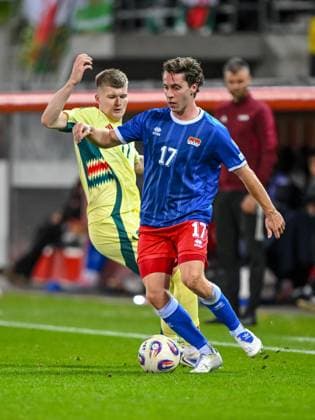 Jordan James Wales and Simon Luechinger Liechtenstein battle for the ball during the FIFA World Cup 2026 qualifier match between Liechtenstein and Wales at Rheinpark Stadion on November 15, 2025 in Vaduz, Liechtenstein Photo by Harry Langer DeFodi Images