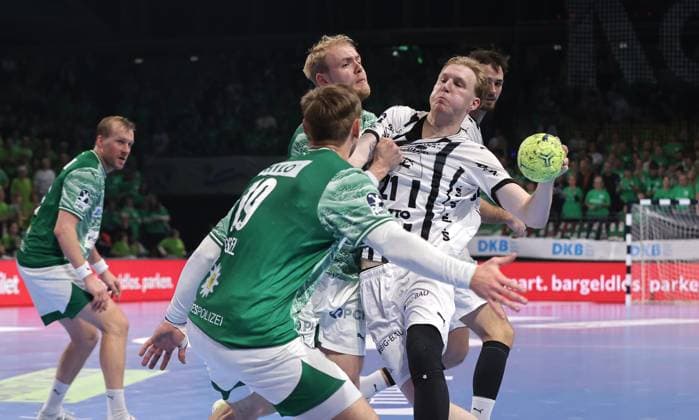 Mathias Gidsel, Matthes Langhoff, Eric Johansson on the ball duel Match scene Action Sport Handball HBL Bundesliga Men 12 Matchday Season 2025 2026 15 11 2025 Füchse Berlin vs THW Kiel