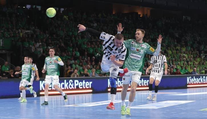 Elias Ellefsen a Skipagotu scores a goal, Mathias Gidsel duel Game scene Action Sport Handball HBL Bundesliga Men 12 Matchday Season 2025 2026 15 11 2025 Füchse Berlin vs THW Kiel