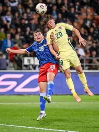 Emanuel Zuend Liechtenstein and Daniel James Wales battle for the ball during the FIFA World Cup 2026 qualifier match between Liechtenstein and Wales at Rheinpark Stadion on November 15, 2025 in Vaduz, Liechtenstein Photo by Harry Langer DeFodi Images
