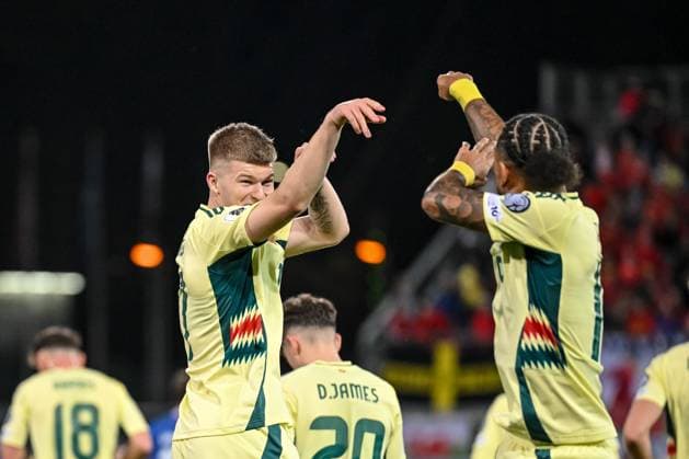 Jordan James Wales celebrates after scoring his team s first goal with teammates during the FIFA World Cup 2026 qualifier match between Liechtenstein and Wales at Rheinpark Stadion on November 15, 2025 in Vaduz, Liechtenstein Photo by Harry Langer DeFodi Images