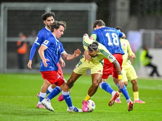 Simon Luechinger Liechtenstein , Sorba Thomas Wales and Julien Hasler Liechtenstein battle for the ball during the FIFA World Cup 2026 qualifier match between Liechtenstein and Wales at Rheinpark Stadion on November 15, 2025 in Vaduz, Liechtenstein Photo by Harry Langer DeFodi Images