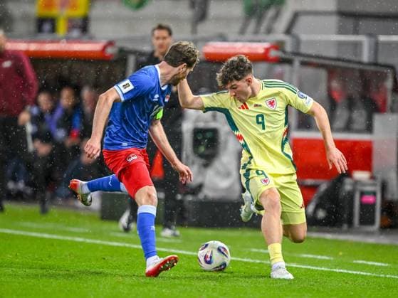 Julien Hasler Liechtenstein and Lewis Koumas Wales battle for the ball during the FIFA World Cup 2026 qualifier match between Liechtenstein and Wales at Rheinpark Stadion on November 15, 2025 in Vaduz, Liechtenstein Photo by Harry Langer DeFodi Images