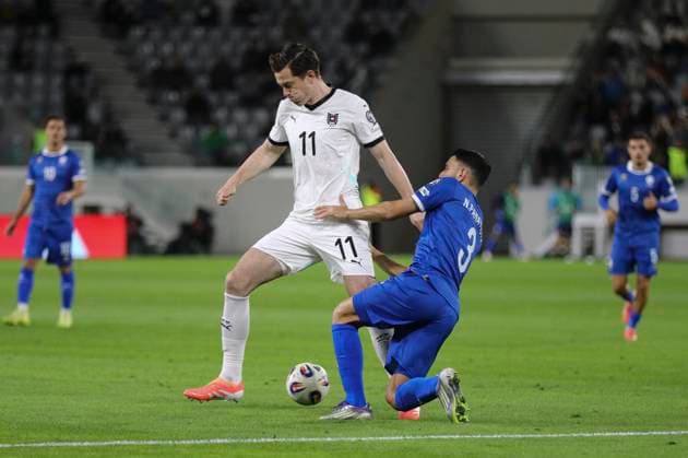 Cyprus Austria WCup Soccer Austria s Michael Gregoric, in the center, controls the ball during the World Cup 2026 group H qualifying soccer match between Cyprus and Austria, in Limassol, Cyprus, Saturday, Nov. 15, 2025. Limassol Cyprus  Copyright: xDanilxShamkinx originalFilename:shamkin-notitle251115_npryo.jpg