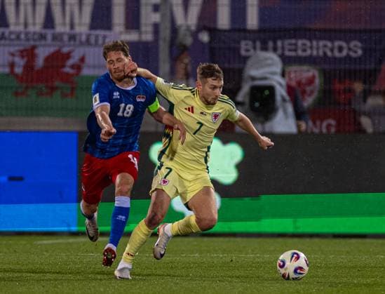 Football - FIFA World Cup, WM, Weltmeisterschaft, Fussball 2026 Qualifying - Group J - Liechtenstein v Wales VADUZ, LIECHTENSTEIN - Saturday, November 15, 2025: Wales David Brooks (R) is challenged by Liechtenstein s captain Nicolas Hasler during the FIFA World Cup 2026 Qualifying Group J match between Liechtenstein and Wales at the Rheinpark Stadion. (Photo by David Rawcliffe Propaganda) VADUZ Rheinpark Stadion VADUZ LIECHTENSTEIN  Copyright: xDavidxRawcliffex P2025-11-15-Liechenstein_Wales-85