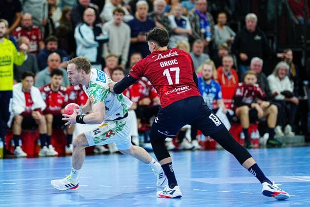 Omar Ingi Magnusson SC Magdeburg, 14 , Marco Grgic SG Flensburg Handewitt, 17 GER, SG Flensburg Handewitt vs SC Magdeburg, Handball, Bundesliga, Matchday 12, Season 2026 2026, 15 11 2025 GER, SG Flensburg Handewitt vs SC Magdeburg, Handball, Bundesliga, Matchday 12, Season 2026 2026, 15 11 2025 Flensburg Copyright: xEibner-Pressefoto MarcelxvonxFehrnx EP_MFN
