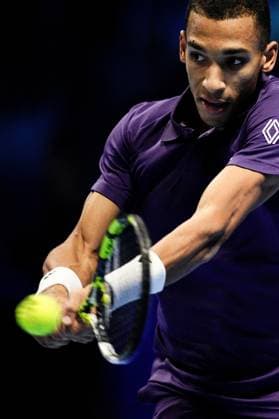 Canada s Felix Auger Aliassime returns the ball to Spain s Carlos Alcaraz during the singles semi-finals tennis match of the ATP, Tennis Herren World Tour Finals at the Inalpi Arena in Turin, Italy - Saturday, Nov. 15, 2025. -  Copyright: xMarcoxAlpozzi LaPressex