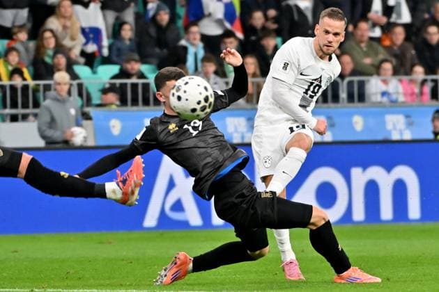 Ljubljana, Slovenia, November 15th 2025, Dion Gallapeni of Kosovo (L) in action against Timi Max Elsnik of Slovenia (R) during the UEFA European Qualifiers for 2026 World Cup, Group B match between Slovenia and Kosovo at Stadium Stozice, Ljubljana, Slovenia. (Photo by Igor Kupljenik Sports Press Photo) Copyright: xIgorxKupljenikx xSPPx Sportspressphoto_SPR62162