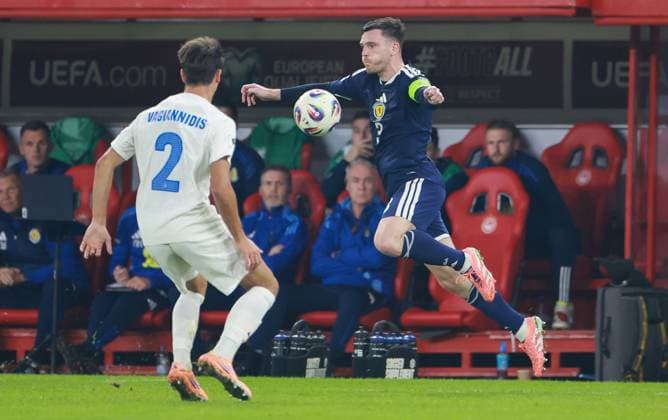 Andy Robertson of Scotland with Giorgos Vagiannidis of Greece Greece v Scotland, FIFA 2026 World Cup Qualifying, Group C, Football, Georgios Karaiskakis Stadium, Athens, Greece - 15 Nov 2025Athens Georgios Karaiskakis Stadium Greece EDITORIAL USE ONLY No use with unauthorised audio, video, data, fixture lists, club league logos or live services. Online in-match use limited to 120 images, no video emulation. No use in betting, games or single club league player publications. Copyright: xNikolaxKrstic Shutterstockx 15786160ch