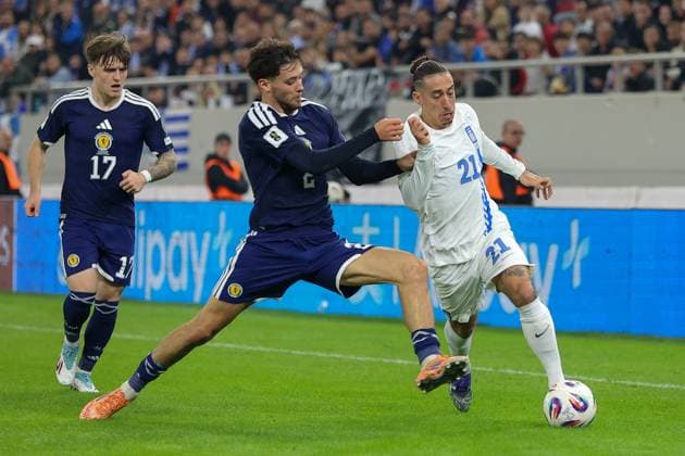 Greece v Scotland 2026 FIFA World Cup, WM, Weltmeisterschaft, Fussball Qualifiers Kostas Tsimikas of Greece and Aaron Hickey of Scotland in action during the 2026 FIFA World Cup Qualifiers Group C match at Karaiskakis Stadium, Piraeus UK Newspapers OUT Copyright: xYannisxHalasx FIL-22494-0044