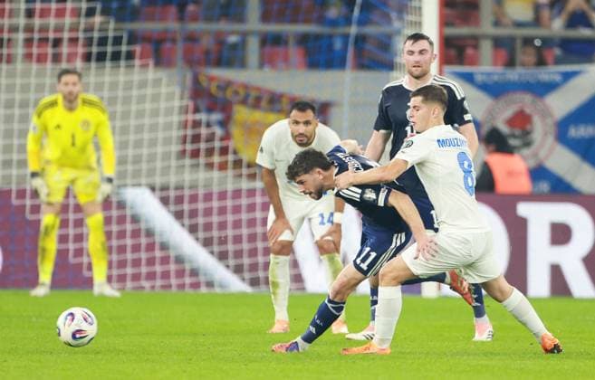Connor Barron of Scotland takes on Fotis Ioannidis of Greece Greece v Scotland, FIFA 2026 World Cup Qualifying, Group C, Football, Georgios Karaiskakis Stadium, Athens, Greece - 15 Nov 2025Athens Georgios Karaiskakis Stadium Greece EDITORIAL USE ONLY No use with unauthorised audio, video, data, fixture lists, club league logos or live services. Online in-match use limited to 120 images, no video emulation. No use in betting, games or single club league player publications. Copyright: xNikolaxKrstic Shutterstockx 15786160cx
