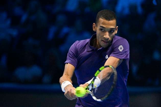 15th November 2025; Palasport Olimpico Arena, Turin, Italy; Nitto ATP, Tennis Herren Finals Tennis 2025; Felix Auger-Aliassime of Canada plays a backhand against Carlos Alcaraz of Spain  BestxImages