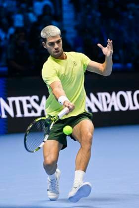 15th November 2025; Palasport Olimpico Arena, Turin, Italy; Nitto ATP, Tennis Herren Finals Tennis 2025; Carlos Alcaraz of Spain plays a backhand against Felix Auger-Aliassime of Canada  BestxImages